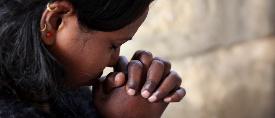 Indian woman praying