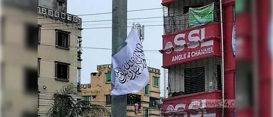 Flag hanging on a pole in a city