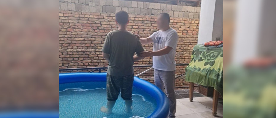 Muhat's secret baptism in a pool in Central Asia