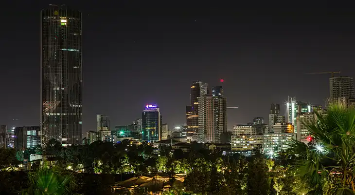 The skyscrapers of Addis Ababa, Ethiopia's capital city, stand tall against a night sky