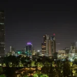The skyscrapers of Addis Ababa, Ethiopia's capital city, stand tall against a night sky